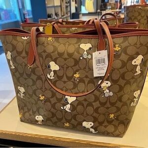 Coach X Peanuts City Tote In Signature Canvas With Snoopy Woodstock Print